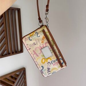Coach Multicolor Pastel Logo Wristlet with Brown Trim